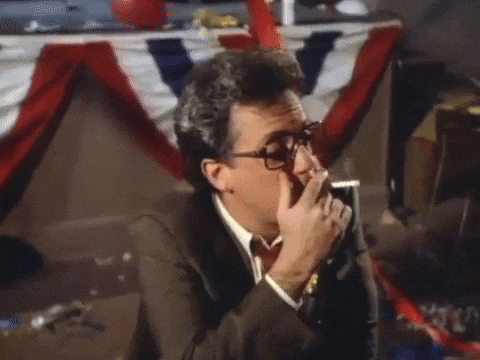 Billy Joel Smoking Cigar GIF