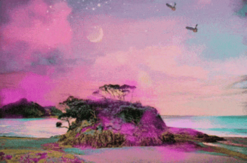 Birds Flying Over Small Island in Ocean
