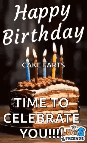 Birthday Cake With Candles on Wooden Table