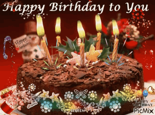 Birthday Cake With Candles Saying Happy Birthday To You