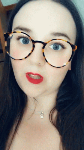 Flirty Biting Lip Smooch Youtuber GIF