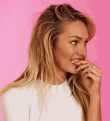 Biting Nails Candice Swanepoel Agreeing Nod GIF
