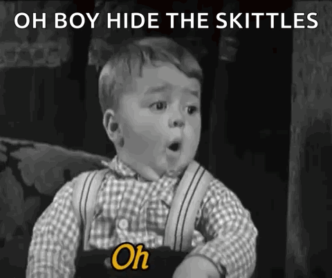 Black and White Baby Mouth Open Oh Boy Hide the Skittles