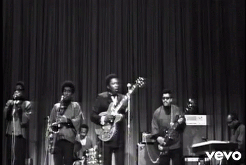 Black And White Band On Stage With Vevo GIF