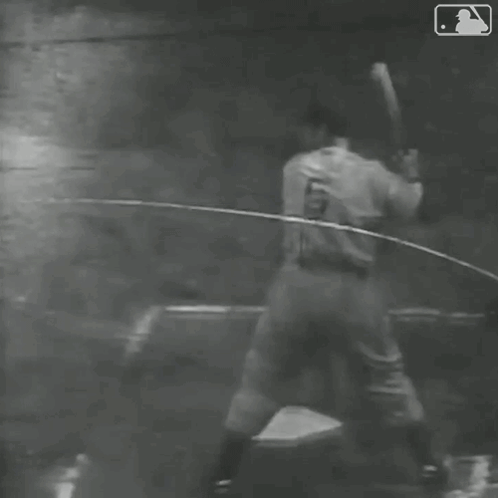 Black and White Baseball Player Running to Base