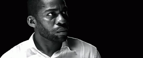 Black and White Bearded Man in White Shirt