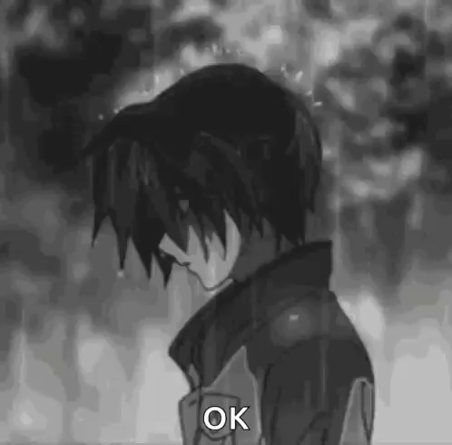 Black and White Boy Standing in Rain Saying Ok