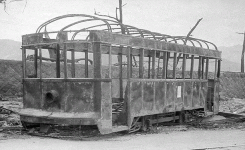 Black and White Burned Out Bus Number 1