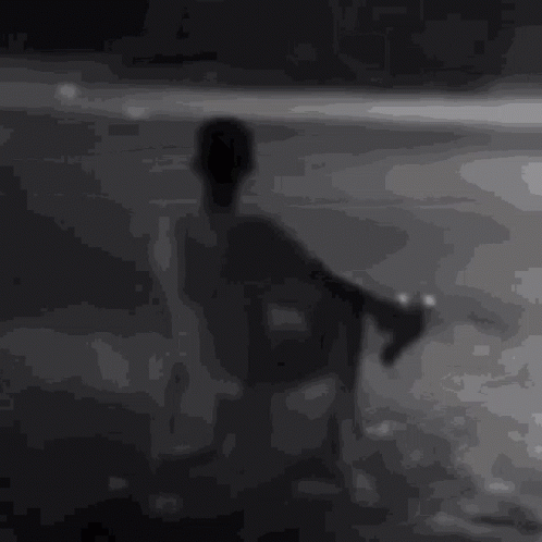Black and White Car Driving at Night