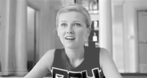 Black And White Cheerleader In Uniform GIF