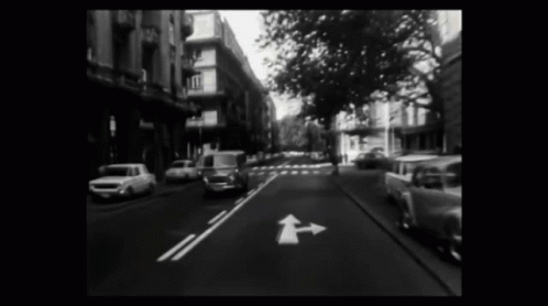 Black And White City Street With Van GIF