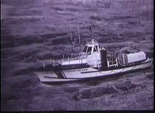 Black and White Coast Guard Boat in Water