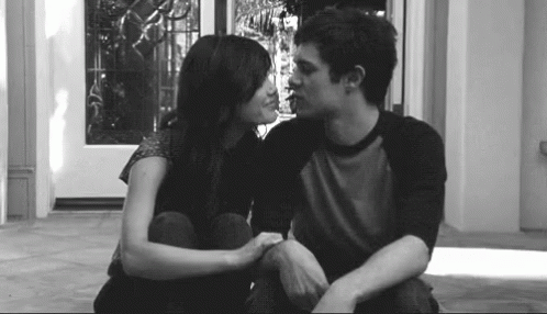 Black and White Couple Kissing