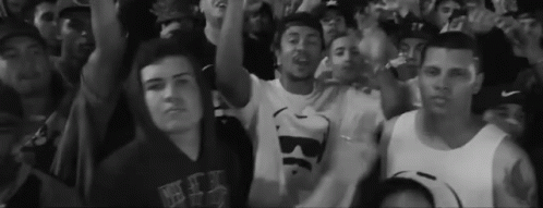 Black and White Crowd Man in Shirt Saying Be