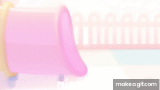 Black and White Dog Going Through Pink Tunnel
