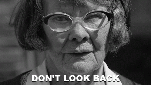 Black and White Elderly Woman With Glasses Don't Look Back