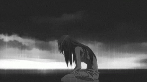 Black and White Girl Kneeling in the Rain