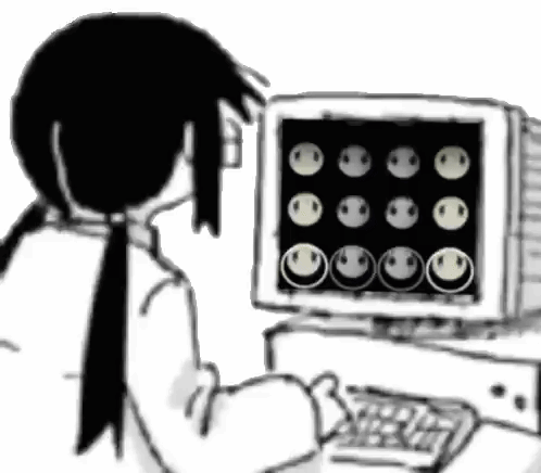 Black and White Girl Sitting at Computer With Smiley Faces