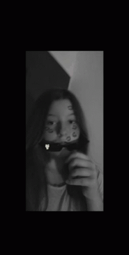 Black and White Girl Taking Selfie