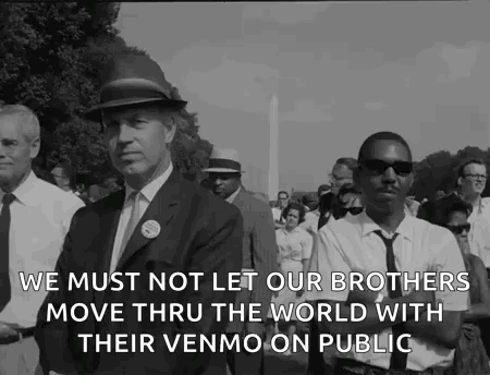 Black and White Group of Men Walking Down Street With Quote