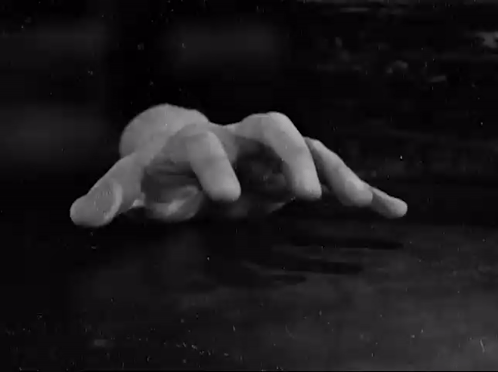 Black and White Hand Reaching Out