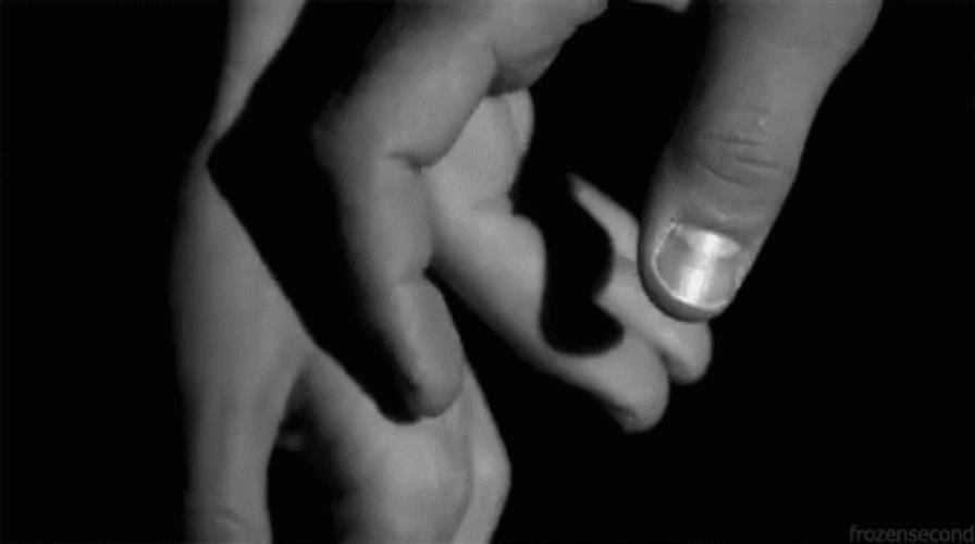 Black And White Hold Hands GIF