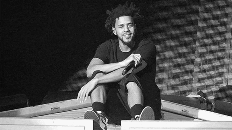 Black And White J Cole Holding Mic GIF