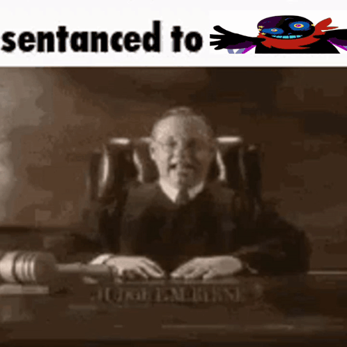Black And White Judge Sitting At Desk With Sentenced To GIF