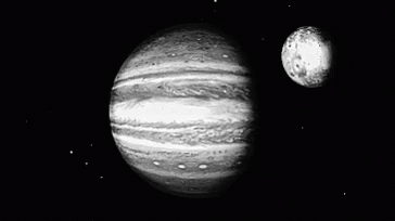 Black And White Jupiter And Its Moon GIF