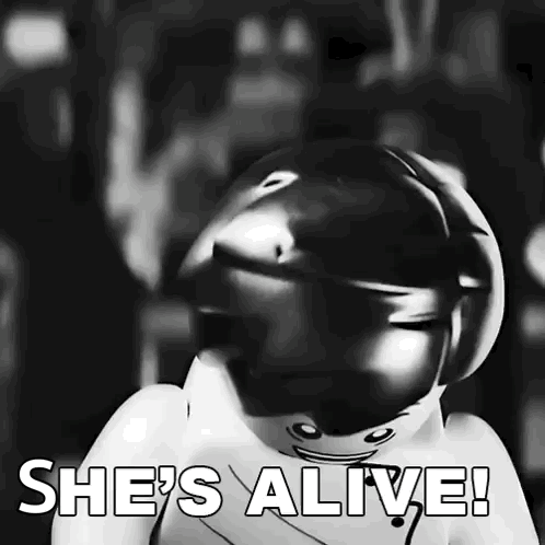 Black and White Lego Figure Saying She's Alive