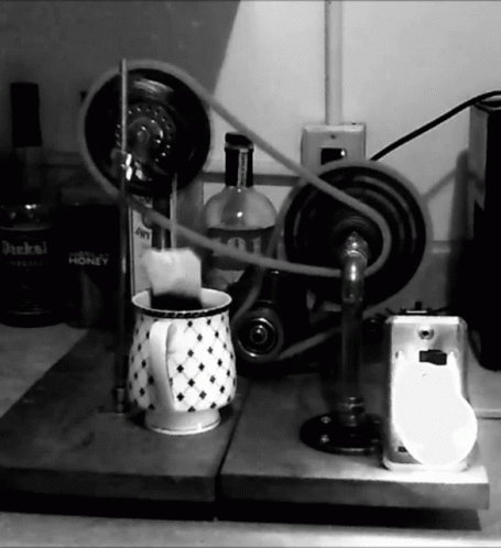 Black And White Machine With Dickel Distilled Honey Bottle GIF