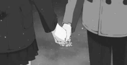 Black And White Man And Woman Holding Hands In Snow GIF