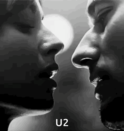 Black And White Man And Woman Kissing GIF