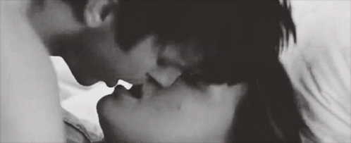 Black and White Man and Woman Kissing