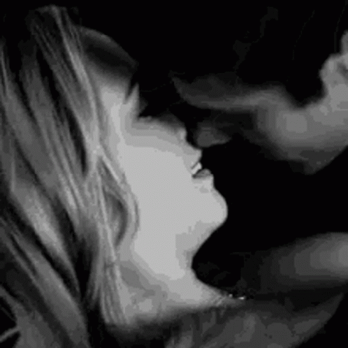 Black and White Man and Woman Kissing