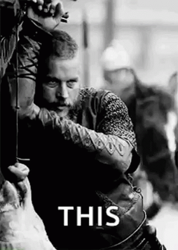 Black And White Man Holding Bow And Arrow Saying This GIF