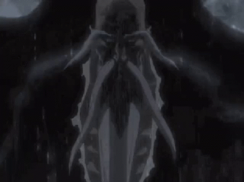 Black and White Man Holding Skull in Rain