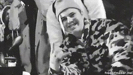 Black and White Man in Camouflage Jacket Beanie