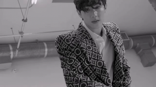 Black and White Man in Patterned Suit