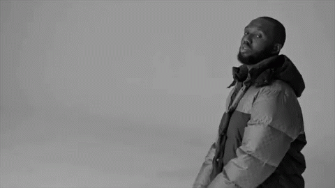Black And White Man In Puffer Jacket GIF