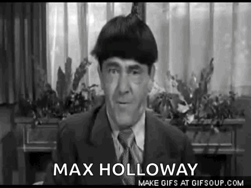 Black and White Man in Suit and Tie Max Holloway