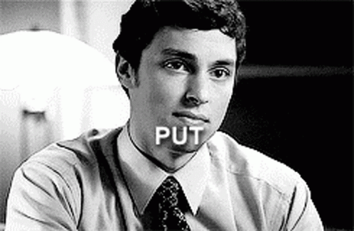 Black and White Man in Suit and Tie Saying Put