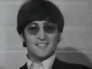Black And White Man In Suit, Tie, And Sunglasses GIF