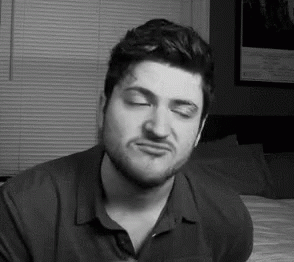 Black and White Man Making Funny Face Eyes Closed