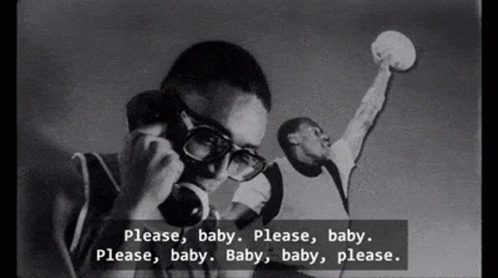 Black and White Man on Phone Saying Please Baby