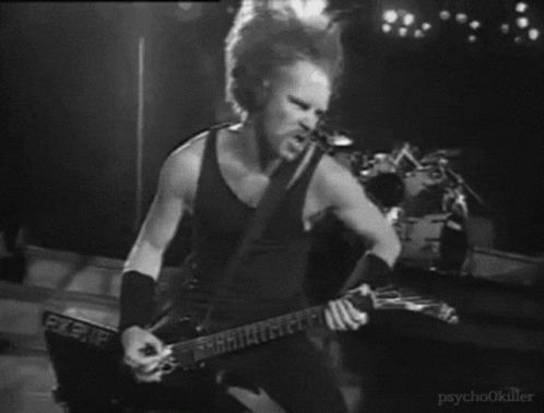 Black And White Man Playing Guitar On Stage GIF