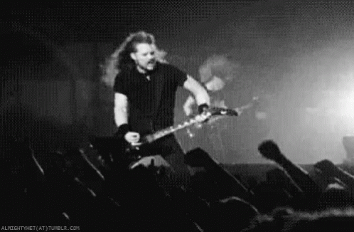 Black And White Man Playing Guitar On Stage GIF
