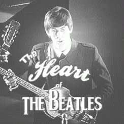 Black and White Man Playing Guitar The Heart of the Beatles