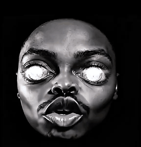 Black and White Man's Face with Glowing Eyes