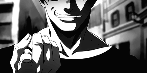 Black and White Man Smiling Pointing at Camera